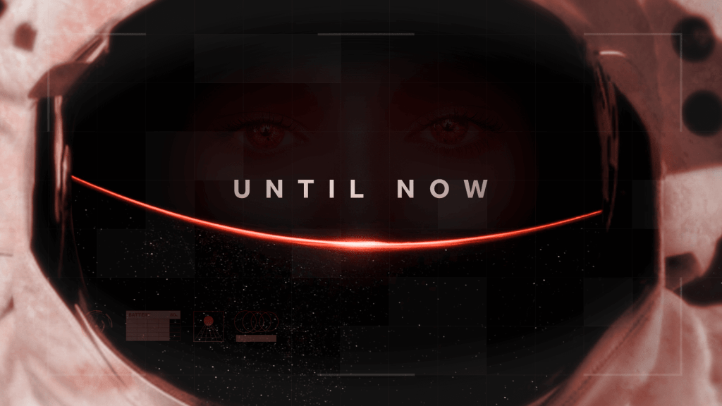 A frame with an astronauts face in the helmet, with the text "Until now" on screen.
